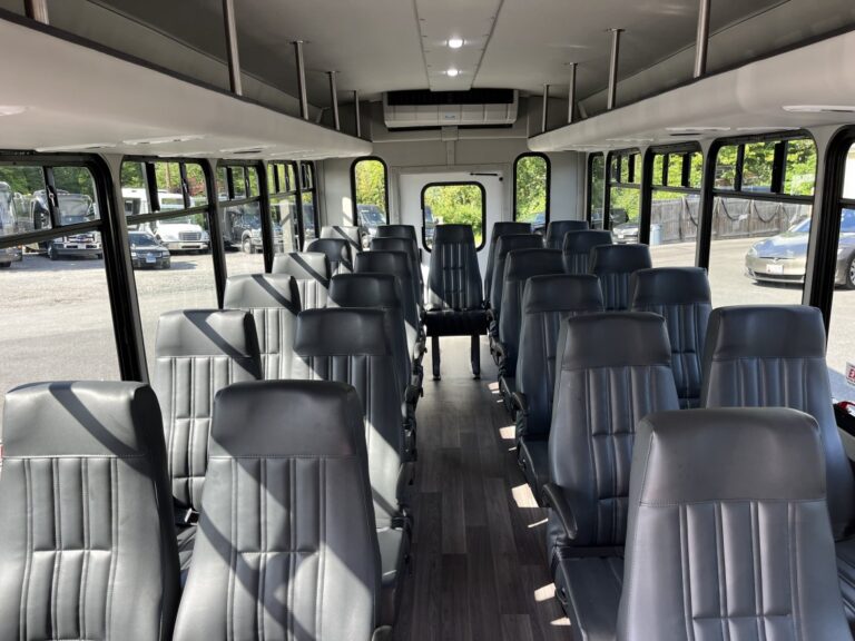 the interior of a 32 passenger mini bus