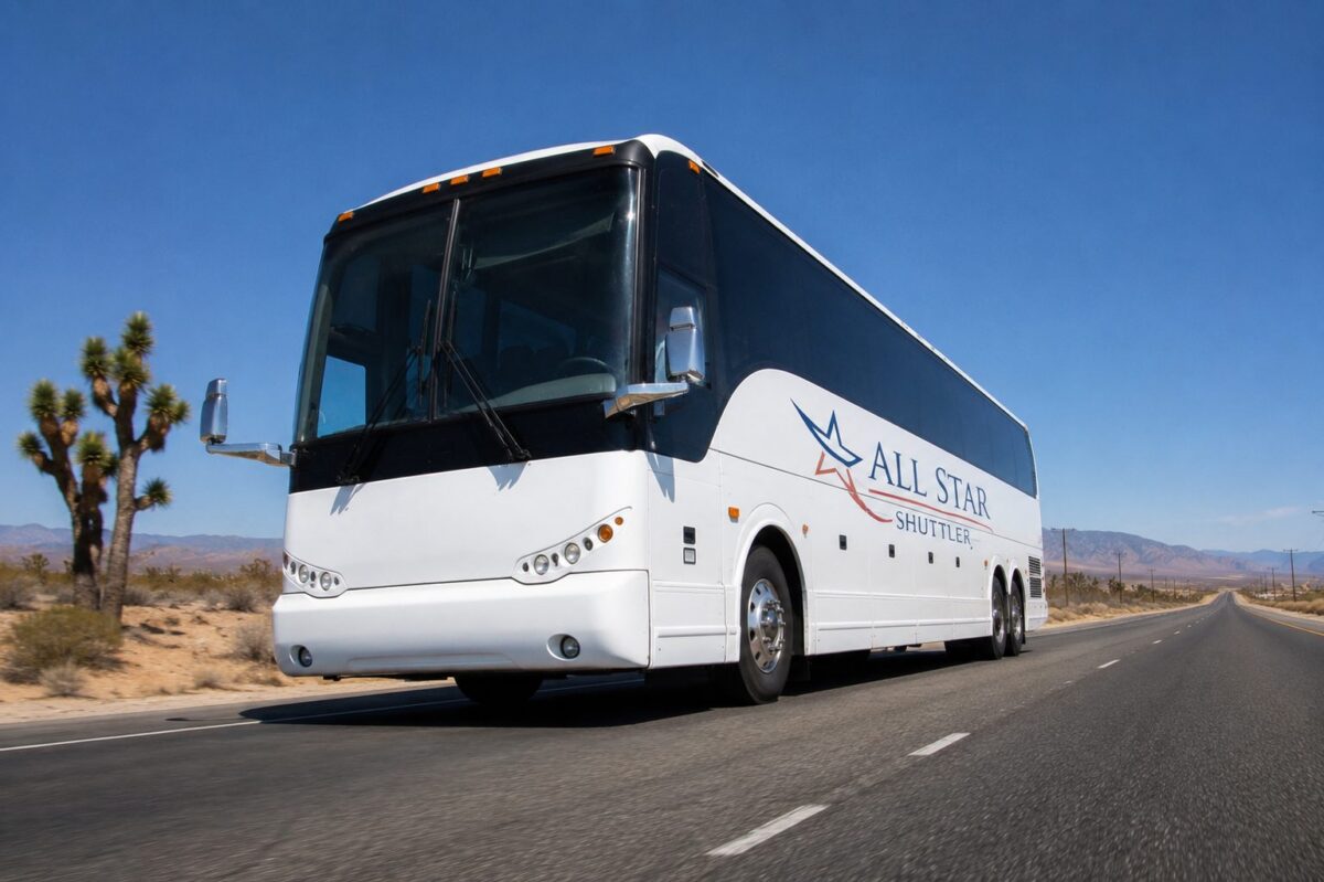 Allstar Shuttles charter bus on I-15 desert highway between Las Vegas and Los Angeles — group transportation for FIFA World Cup 2026