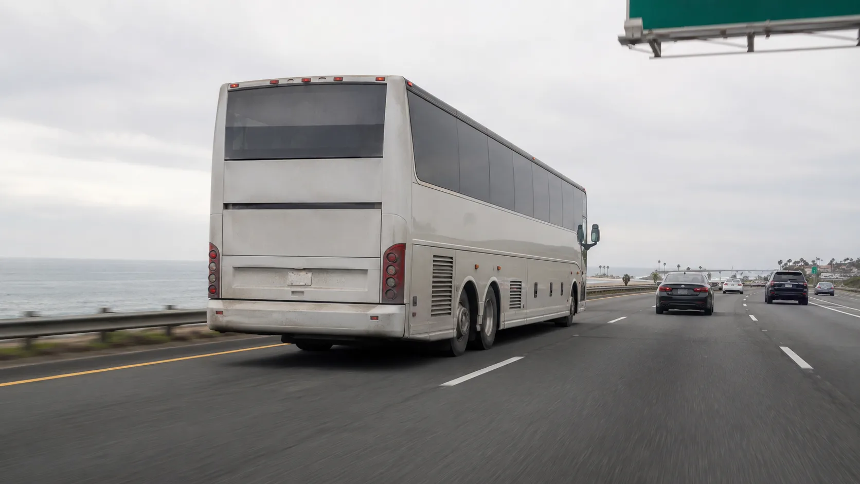 Charter bus traveling the Pacific Coast Highway on a Los Angeles day trip
