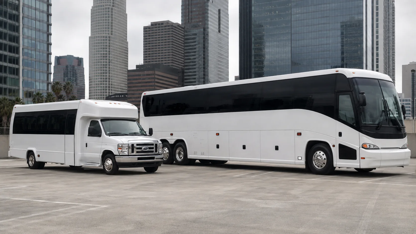Minibus and full-size coach parked together for a convention group transportation booking