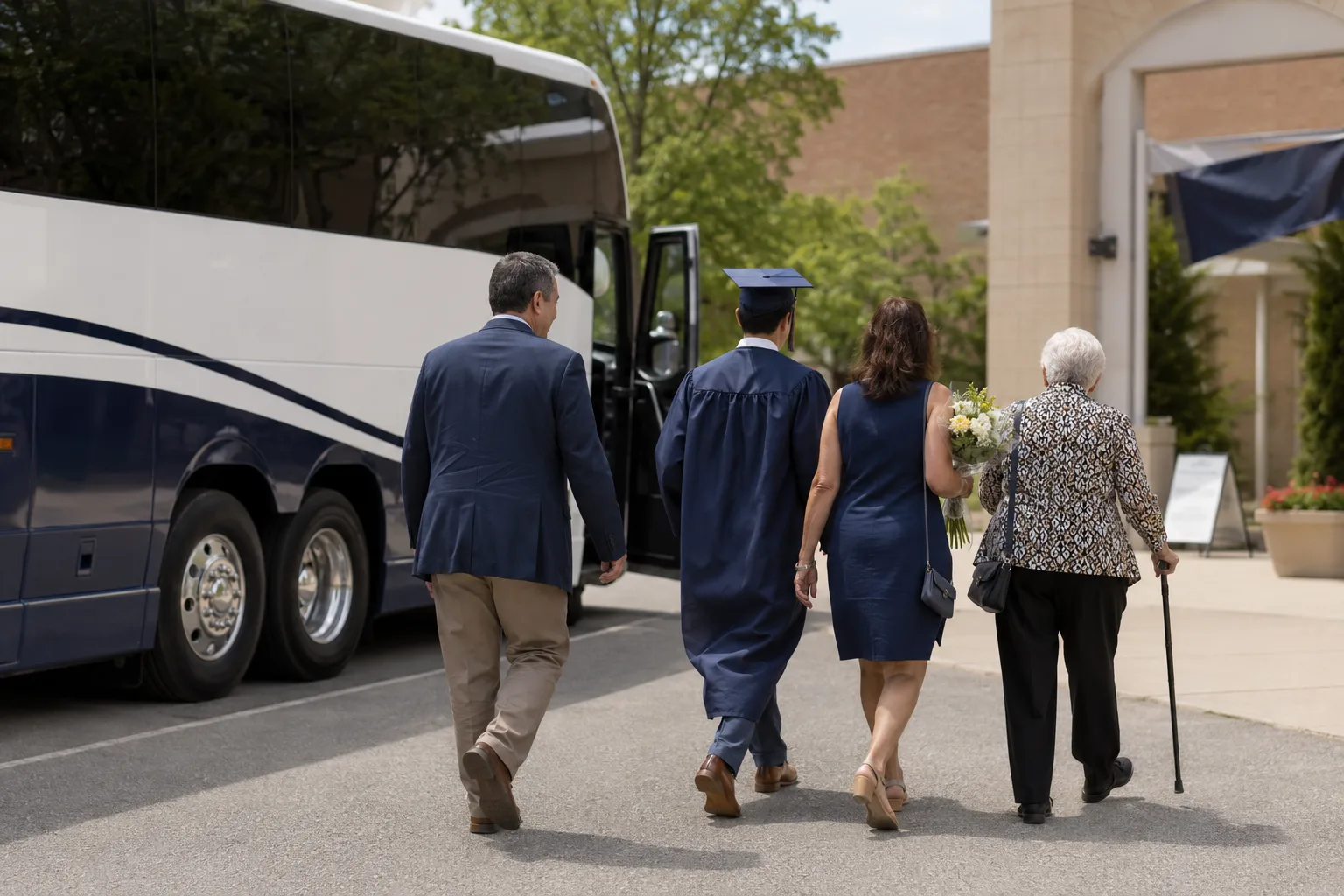 Family arriving by charter bus at a graduation ceremony venue in Los Angeles