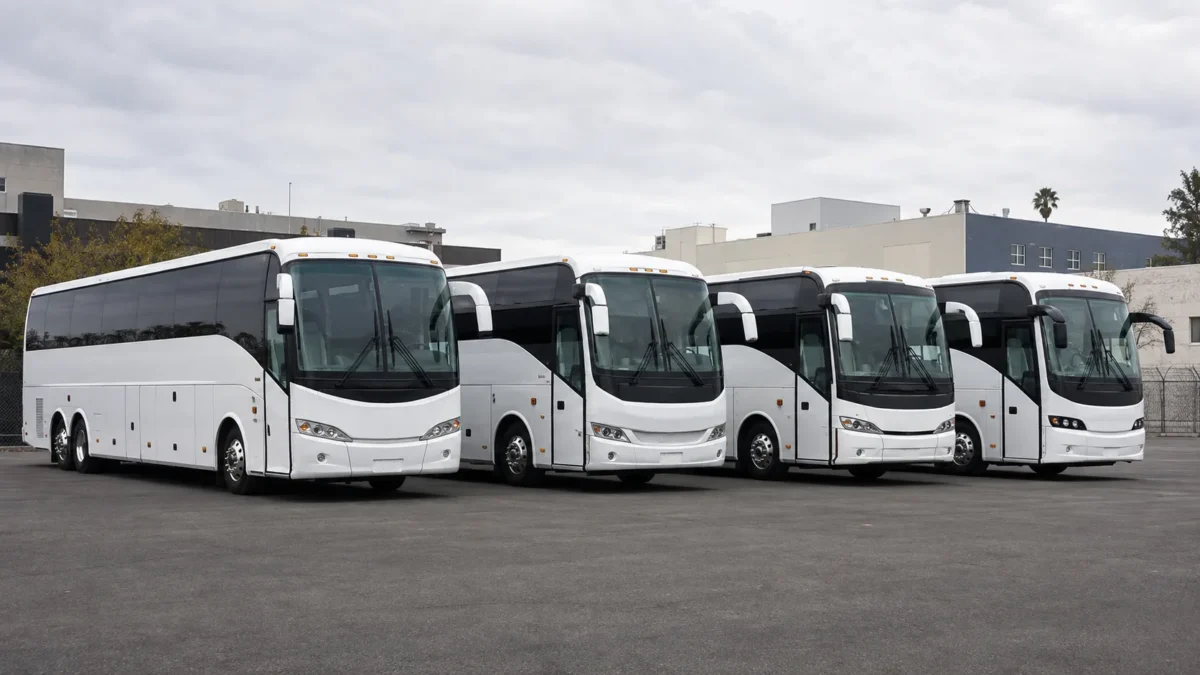 Four charter buses lined up together for a multi-bus large event booking in Los Angeles